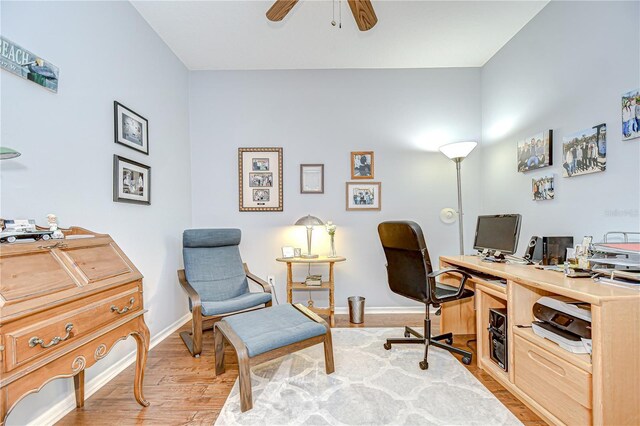 6030 Sandhill Ridge Dr, Lithia, FL 33547 - office with light wood-style floors, a ceiling fan, and baseboards