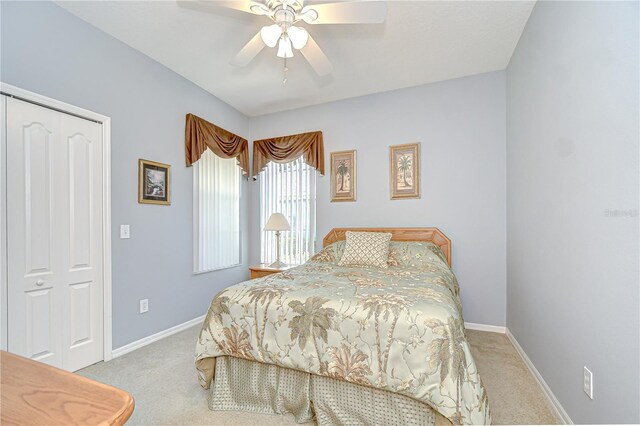 6030 Sandhill Ridge Dr, Lithia, FL 33547 - carpeted bedroom with baseboards and ceiling fan