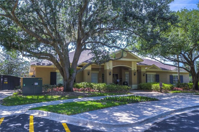 6030 Sandhill Ridge Dr, Lithia, FL 33547 - view of front facade featuring stucco siding