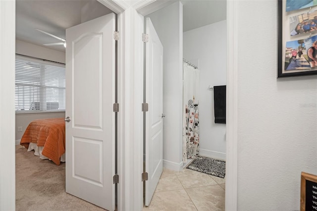11550 Lake Lucaya Dr, Riverview, FL 33579 - hallway with baseboards and light tile patterned flooring