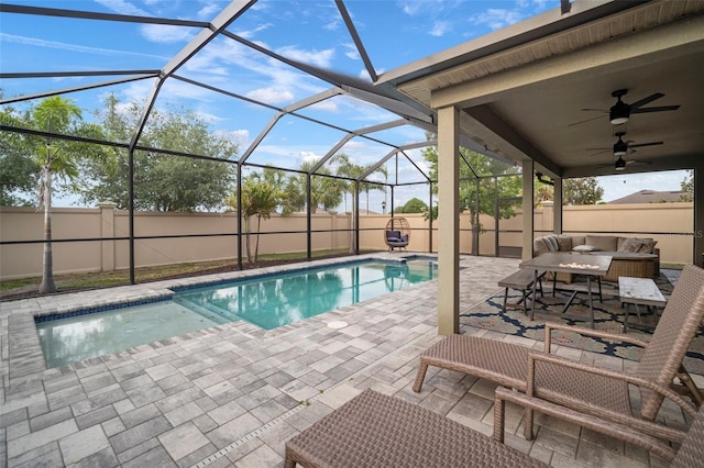 11550 Lake Lucaya Dr, Riverview, FL 33579 - view of pool with a patio area, a fenced backyard, glass enclosure, and a ceiling fan