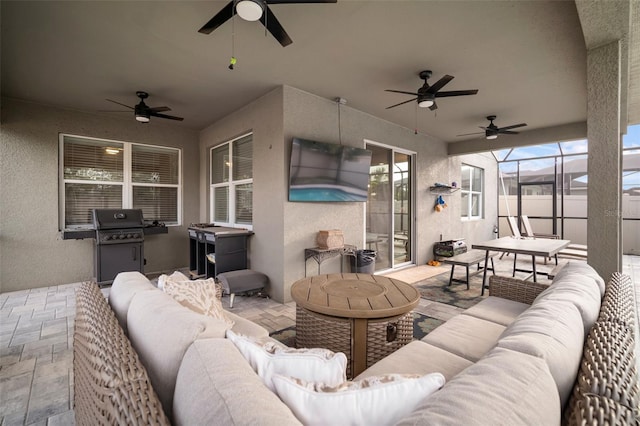 11550 Lake Lucaya Dr, Riverview, FL 33579 - view of patio / terrace with a ceiling fan, an outdoor living space, a grill, and glass enclosure