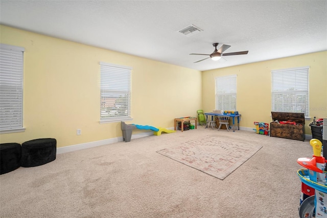 11550 Lake Lucaya Dr, Riverview, FL 33579 - recreation room featuring carpet floors, ceiling fan, and baseboards