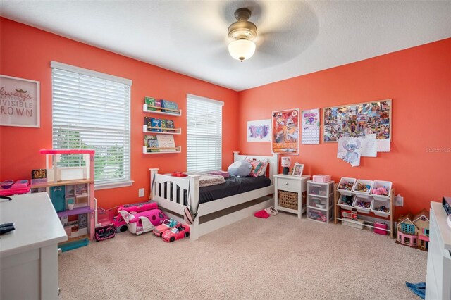 11550 Lake Lucaya Dr, Riverview, FL 33579 - bedroom with carpet and a ceiling fan