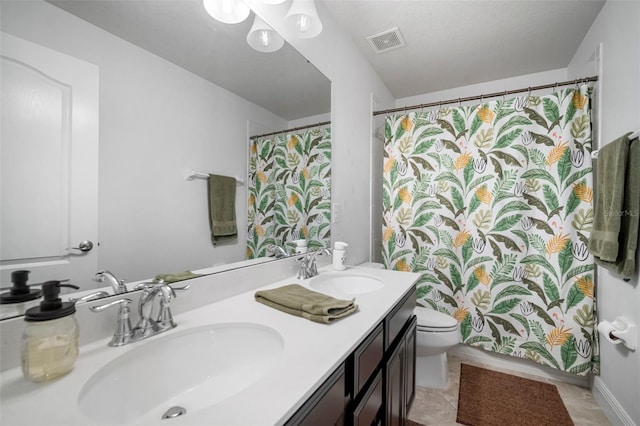 11550 Lake Lucaya Dr, Riverview, FL 33579 - bathroom featuring double vanity, toilet, and a shower with curtain