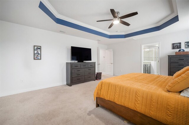 11550 Lake Lucaya Dr, Riverview, FL 33579 - bedroom featuring a tray ceiling, light colored carpet, crown molding, baseboards, and ceiling fan