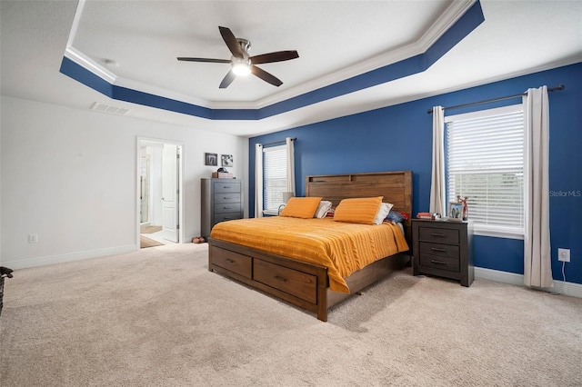 11550 Lake Lucaya Dr, Riverview, FL 33579 - carpeted bedroom with a tray ceiling, multiple windows, crown molding, and baseboards