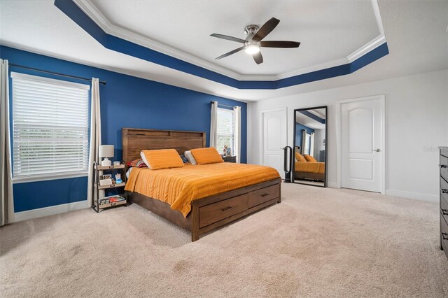 11550 Lake Lucaya Dr, Riverview, FL 33579 - bedroom with a raised ceiling, crown molding, carpet floors, baseboards, and a ceiling fan