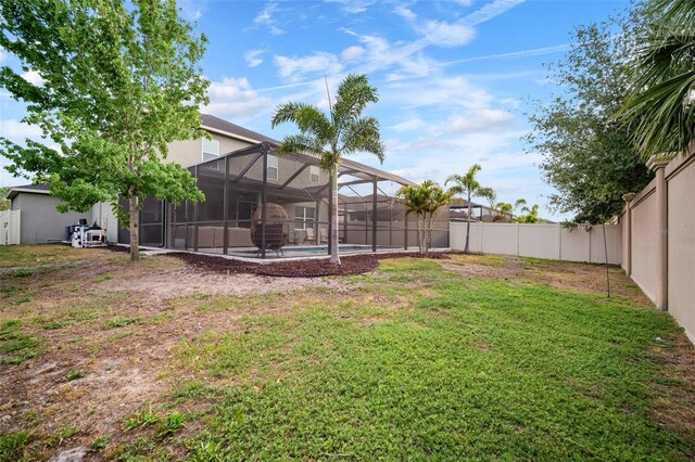 11550 Lake Lucaya Dr, Riverview, FL 33579 - view of yard featuring a lanai and a patio area