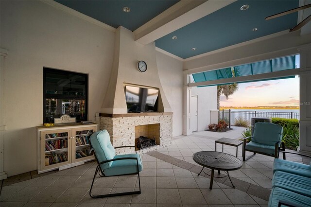 11550 Lake Lucaya Dr, Riverview, FL 33579 - tiled living area featuring ornamental molding, a high ceiling, and an outdoor brick fireplace