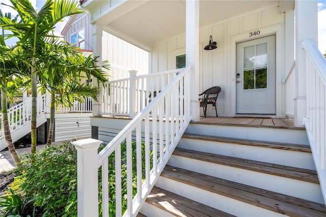 340 6th St E, Bradenton, FL 34208 - entrance to property with board and batten siding and covered porch