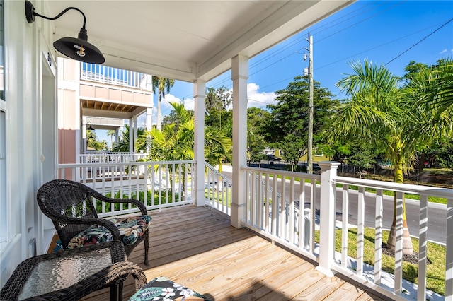 340 6th St E, Bradenton, FL 34208 - wooden terrace featuring covered porch