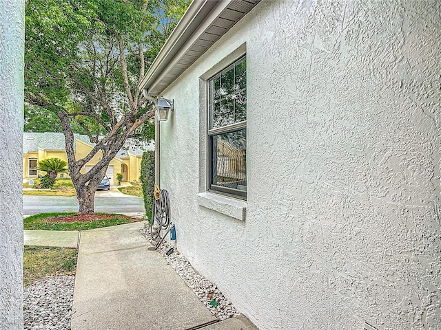 3328 S Whitechappel Pt, Inverness, FL 34452 - view of property exterior featuring stucco siding