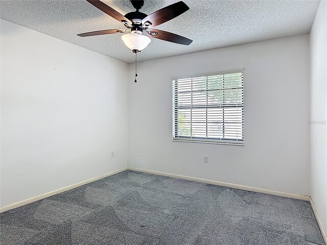 3328 S Whitechappel Pt, Inverness, FL 34452 - carpeted empty room with a ceiling fan, a textured ceiling, and baseboards