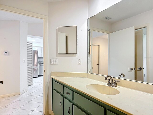 3328 S Whitechappel Pt, Inverness, FL 34452 - bathroom featuring tile patterned flooring, vanity, and baseboards