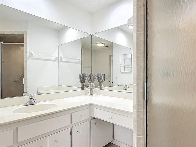 3328 S Whitechappel Pt, Inverness, FL 34452 - bathroom with vanity and a stall shower