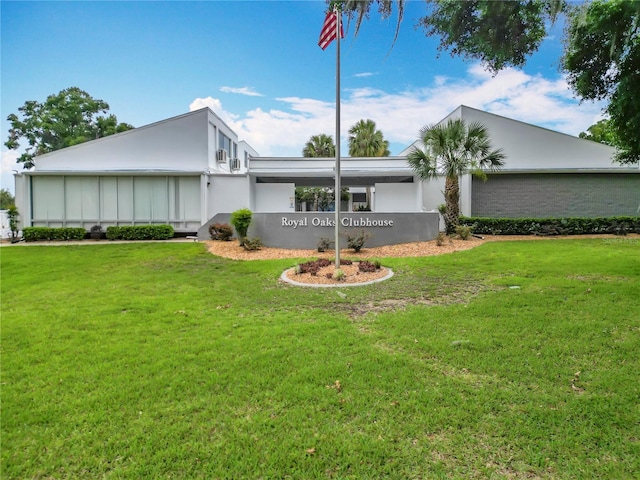 3328 S Whitechappel Pt, Inverness, FL 34452 - view of front of house featuring a front lawn and stucco siding