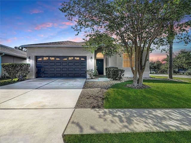 3512 Gerrads Cross Ct, Land O Lakes, FL 34638 - single story home with an attached garage, stucco siding, driveway, and a front yard