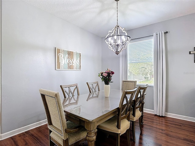 3512 Gerrads Cross Ct, Land O Lakes, FL 34638 - dining area with dark wood-style floors and a chandelier