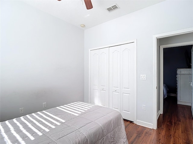 3512 Gerrads Cross Ct, Land O Lakes, FL 34638 - bedroom with wood finished floors, a closet, and a ceiling fan