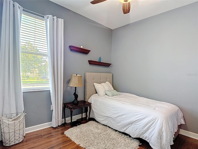 3512 Gerrads Cross Ct, Land O Lakes, FL 34638 - bedroom with wood finished floors and ceiling fan