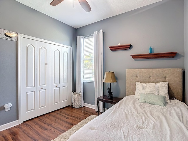 3512 Gerrads Cross Ct, Land O Lakes, FL 34638 - bedroom with wood finished floors, a closet, and ceiling fan