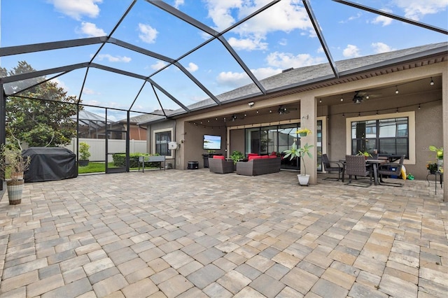 view of patio / terrace featuring an outdoor living space, ceiling fan, a grill, outdoor dining space, and glass enclosure