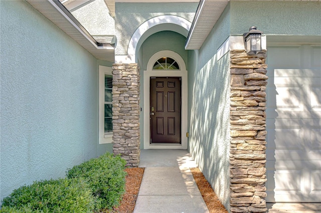 11567 Weston Course Loop, Riverview, FL 33579 - entrance to property featuring stucco siding and stone siding
