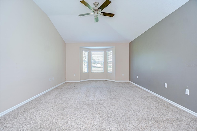 11567 Weston Course Loop, Riverview, FL 33579 - empty room with a ceiling fan, lofted ceiling, light colored carpet, and baseboards