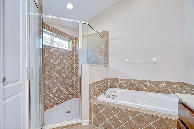 11567 Weston Course Loop, Riverview, FL 33579 - bathroom featuring a bath, a stall shower, vanity, and tile patterned flooring