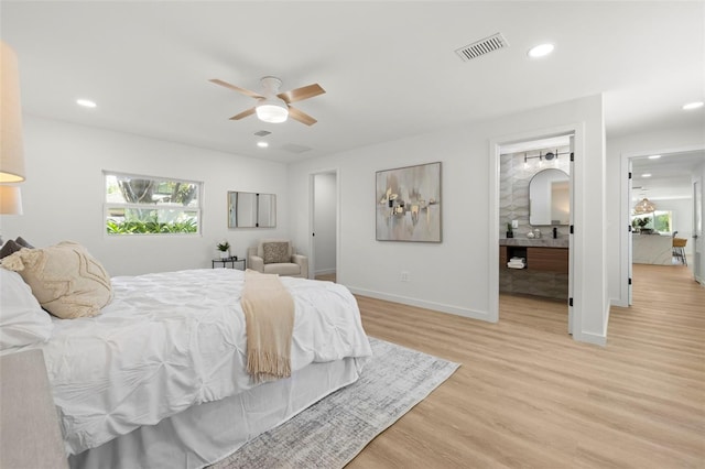 3801 Dr Martin Luther King Jr St N, Saint Petersburg, FL 33703 - bedroom with light wood-style flooring, recessed lighting, baseboards, and ceiling fan