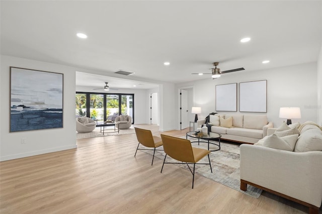 3801 Dr Martin Luther King Jr St N, Saint Petersburg, FL 33703 - living room with a ceiling fan, light wood-style floors, recessed lighting, and baseboards