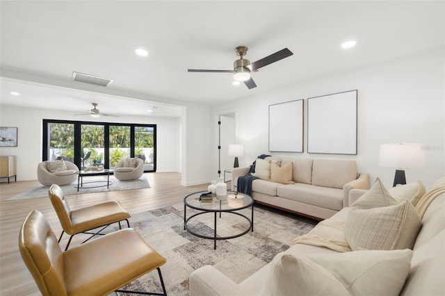 3801 Dr Martin Luther King Jr St N, Saint Petersburg, FL 33703 - living room featuring a ceiling fan, recessed lighting, light wood finished floors, and baseboards