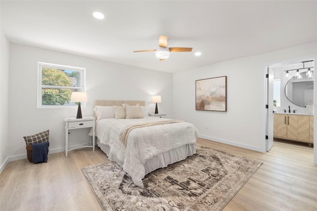 3801 Dr Martin Luther King Jr St N, Saint Petersburg, FL 33703 - bedroom featuring light wood-type flooring, a sink, baseboards, ceiling fan, and recessed lighting