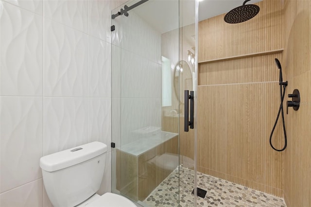 3801 Dr Martin Luther King Jr St N, Saint Petersburg, FL 33703 - full bathroom featuring tile walls, a stall shower, and toilet