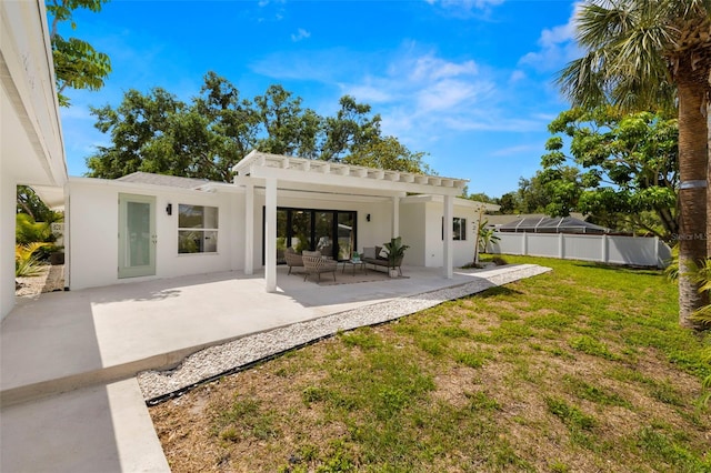 3801 Dr Martin Luther King Jr St N, Saint Petersburg, FL 33703 - back of property with a patio, stucco siding, an outdoor living space, and a pergola