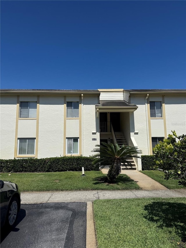 210 Cypress Ct Unit 122, Oldsmar, FL 34677 - view of property with uncovered parking