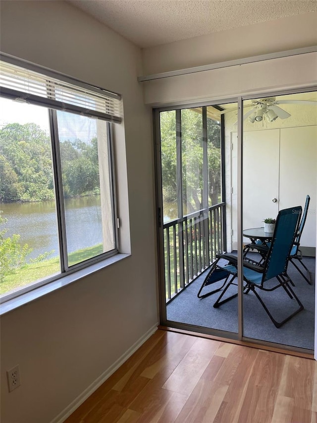 210 Cypress Ct Unit 122, Oldsmar, FL 34677 - sunroom / solarium with a water view
