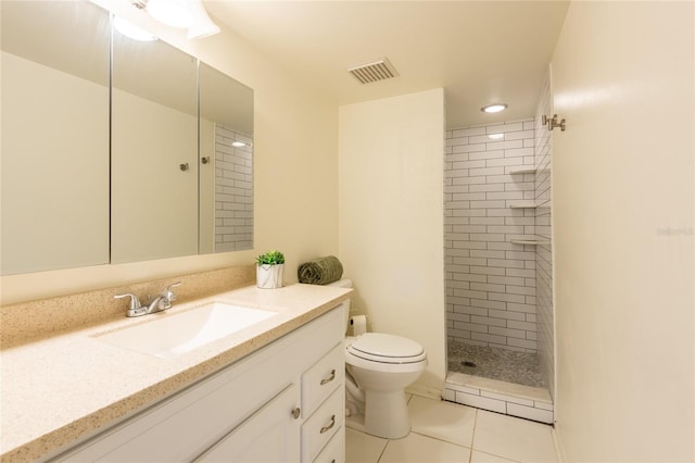 210 Cypress Ct Unit 122, Oldsmar, FL 34677 - full bath featuring vanity, a tile shower, tile patterned flooring, and recessed lighting