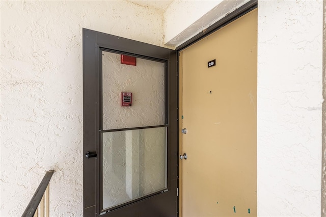 210 Cypress Ct Unit 122, Oldsmar, FL 34677 - property entrance with stucco siding