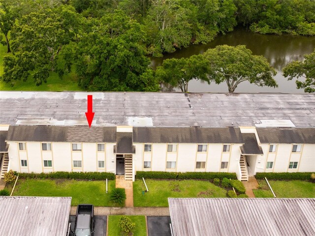210 Cypress Ct Unit 122, Oldsmar, FL 34677 - view of property featuring stairway and a water view