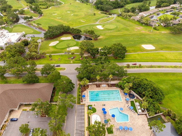 210 Cypress Ct Unit 122, Oldsmar, FL 34677 - drone / aerial view of a golf course and a nearby body of water