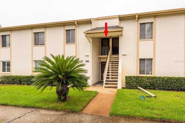 210 Cypress Ct Unit 122, Oldsmar, FL 34677 - view of building exterior featuring stairway