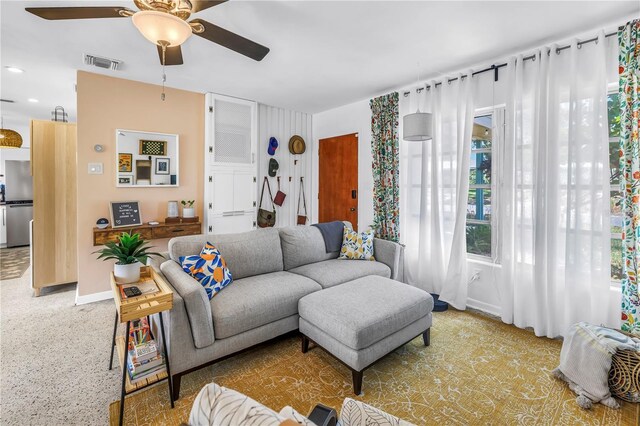 11376 119th Ter, Largo, FL 33778 - living area with a ceiling fan, baseboards, and recessed lighting