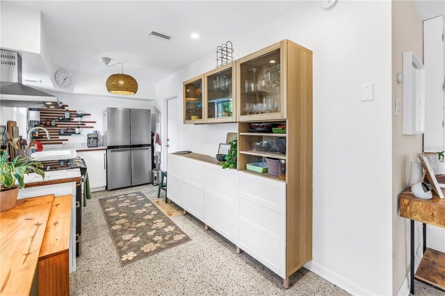 11376 119th Ter, Largo, FL 33778 - kitchen with appliances with stainless steel finishes, wall chimney exhaust hood, glass insert cabinets, white cabinets, and recessed lighting