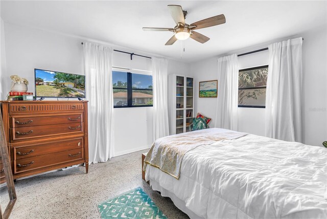 11376 119th Ter, Largo, FL 33778 - bedroom featuring speckled floor and ceiling fan