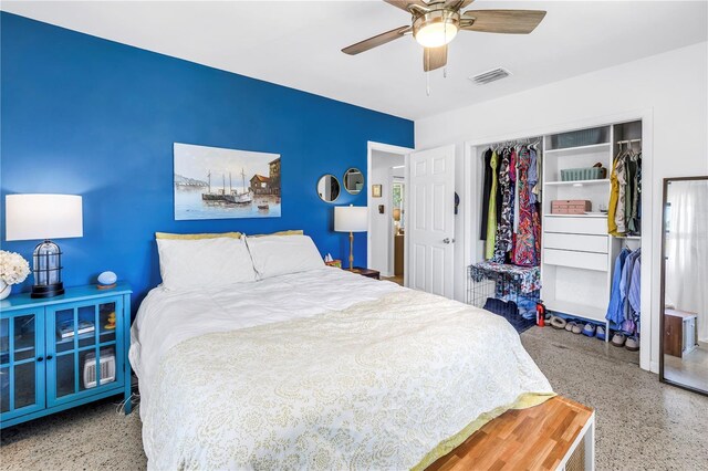 11376 119th Ter, Largo, FL 33778 - bedroom with a closet, speckled floor, and a ceiling fan