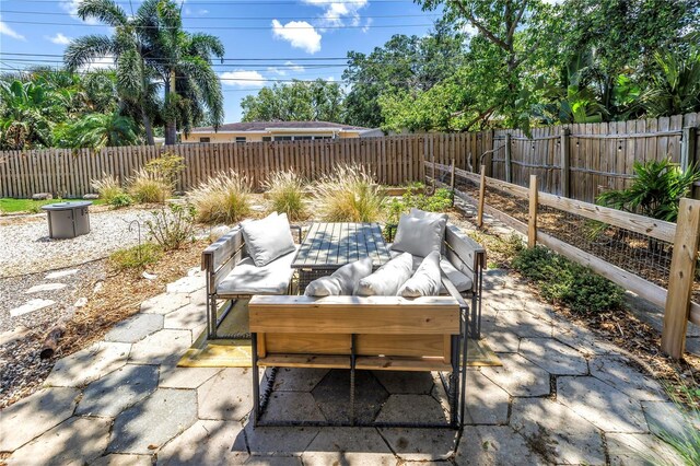 11376 119th Ter, Largo, FL 33778 - view of patio / terrace with a fenced backyard and an outdoor living space