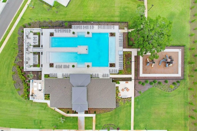 drone / aerial view of a pool