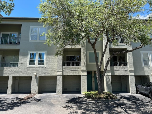 622 Seascape Way, Tampa, FL 33602 - view of apartment building / complex featuring an attached garage